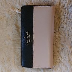 NWT. Large slim bifold wallet.